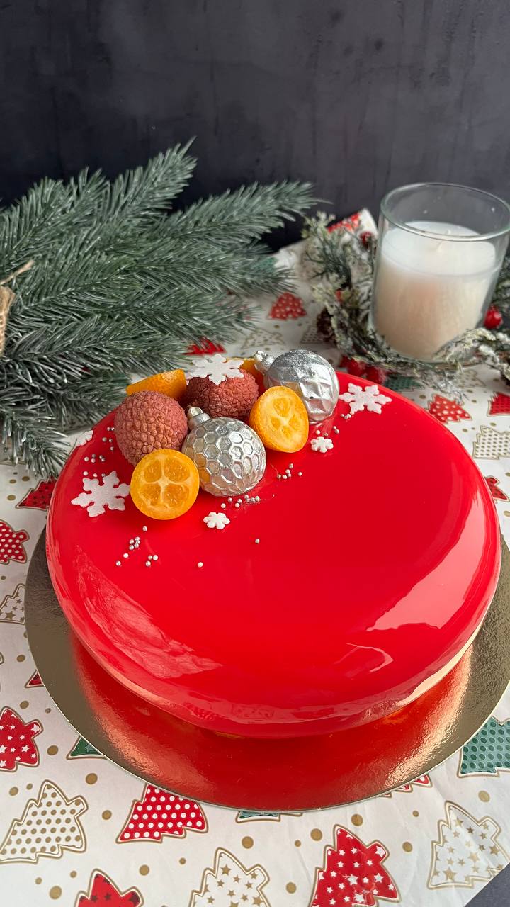 Red mirror-glaze mousse cake with Christmas decor
