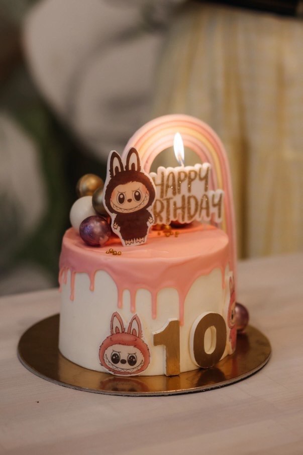 Labubu themed pink drip 10th birthday cake with rainbow